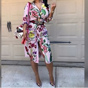 Striped, knotted, floral dress.